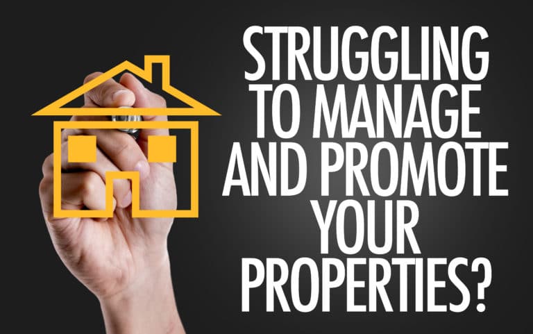 Hand writing the text: Struggling to Manage And Promote Your Properties?